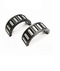 A pair of black and silver metal cuffs.