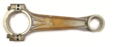 A close up of the bottom end of an old spoon