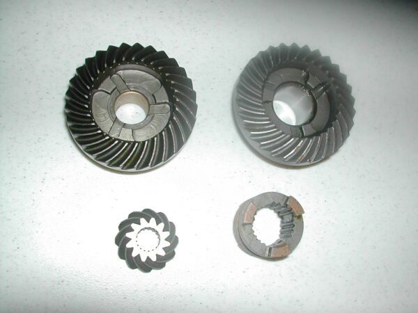 A set of four different gears and one gear ring.