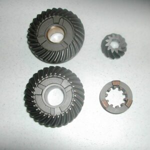 A set of gears and parts for an engine.