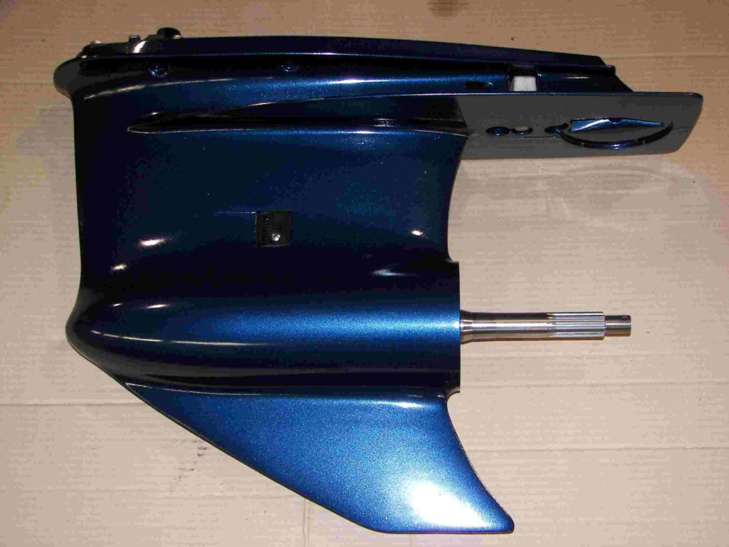 A blue motorcycle seat with the handle and seat post missing.