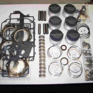 A table with many different parts of a car engine.