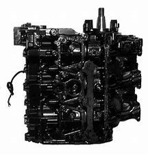 A black engine block with many different parts.