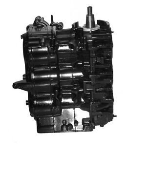 A black and white photo of an engine block.